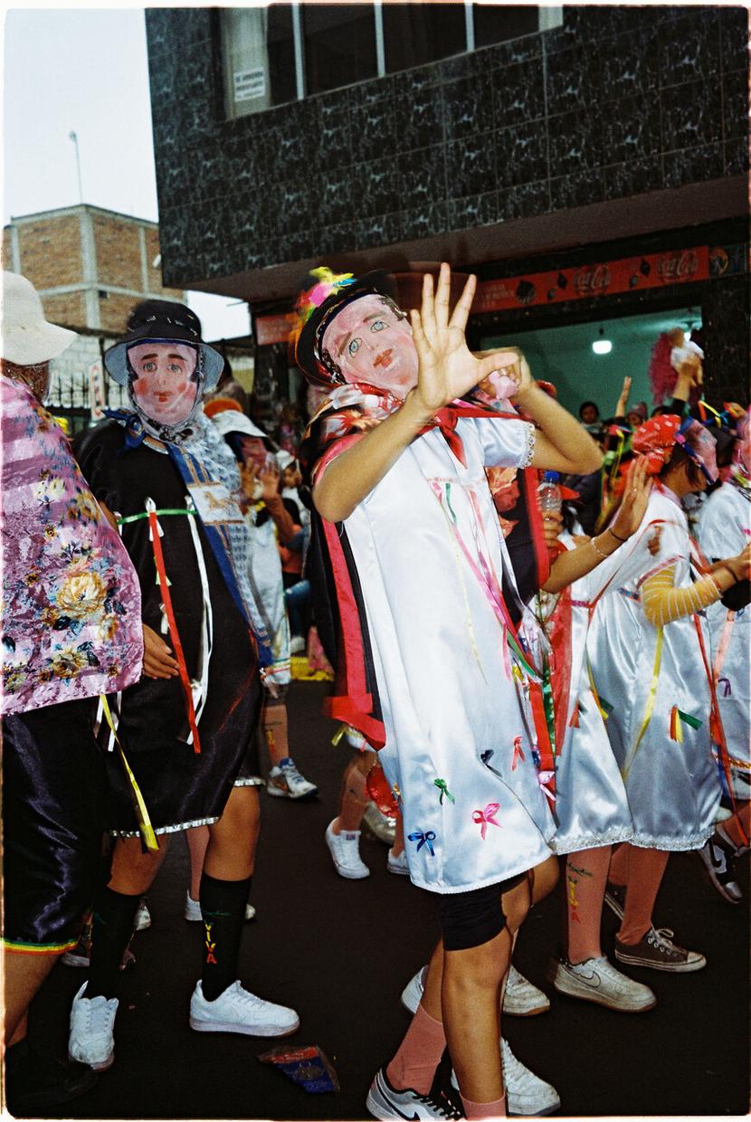 Diablada — white-dress dancers